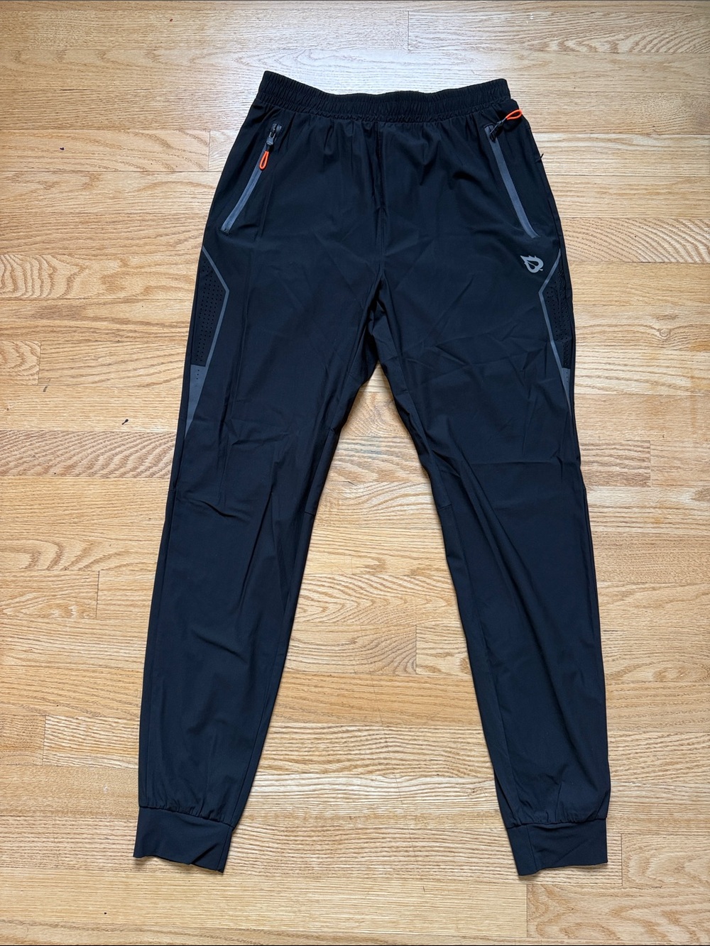 Baleaf Black Jogger Sweatpants with Gray Accents and Orange Zipper Pulls